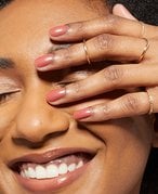 A woman wearing nail polish