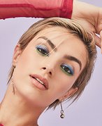 person wearing pastel egg-shaped eye makeup