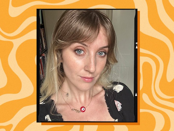 Image of the editor with a brown smoky eye on an orange graphic background
