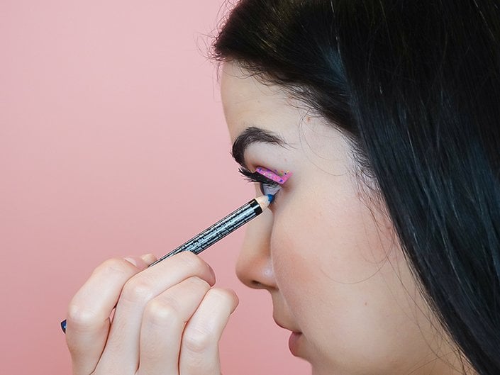 A person using tightline eyeliner