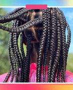 photo of the back of someone’s head with their hair in long box braids