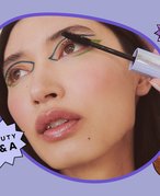 Photo of person with blue and green graphic eyeliner applying mascara, collaged on a purple background with the Beauty Q&A logo
